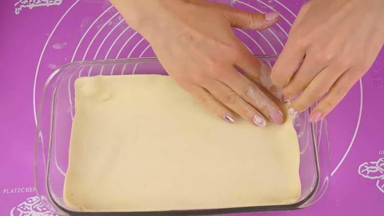 put the dough in the form