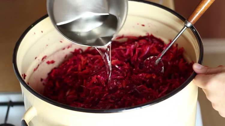 pour water into vegetables