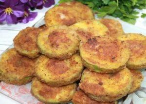 delicious zucchini with minced meat in a pan