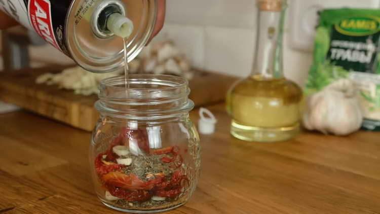 pour tomatoes with oil