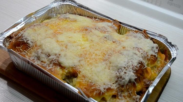 ready chicken with pineapple in the oven under cheese