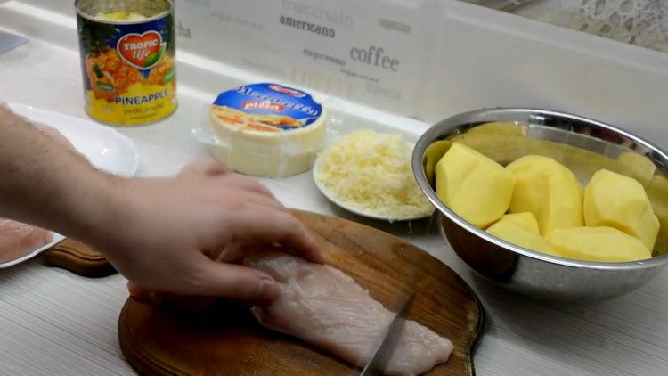 How to cook chicken with pineapple in the oven under cheese