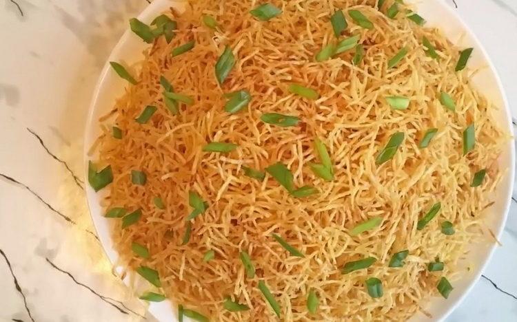 Anthill salad with chicken on the festive table