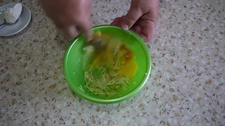 mix grated squash and egg