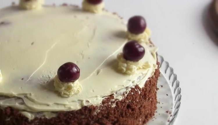 decorate the cake with cherries