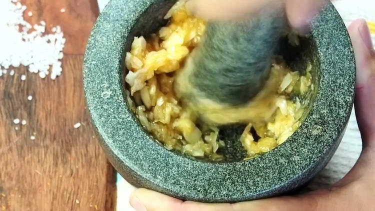 chop the garlic in a mortar