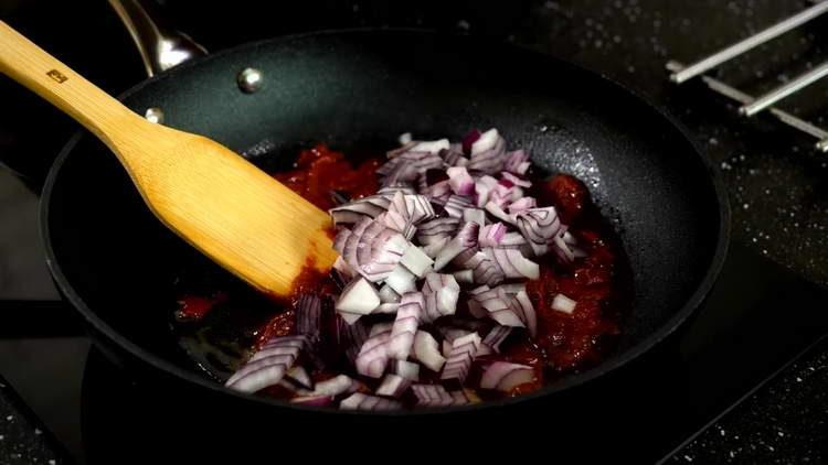 put the onion in a pan