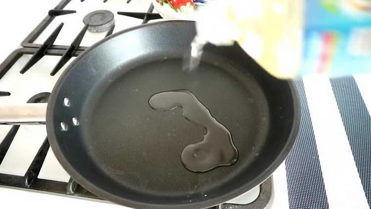 pour oil into the pan