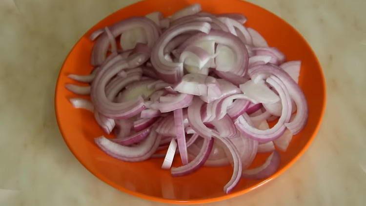 cut the onions in half rings