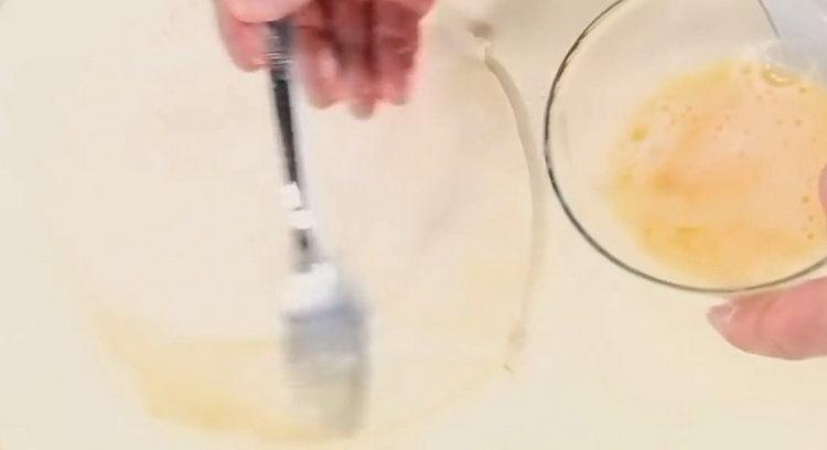 grease the dough with an egg