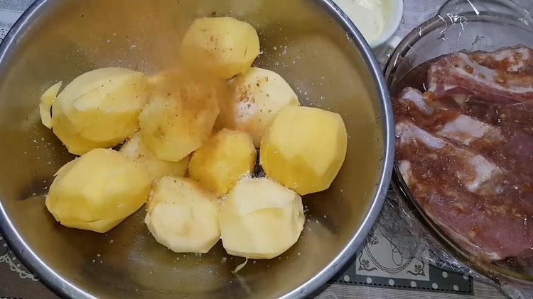 add spices to potatoes