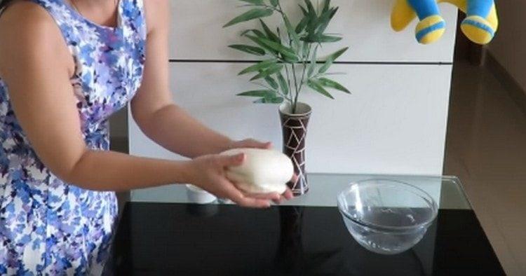 We knead the dough, stretch it and let it rise again.