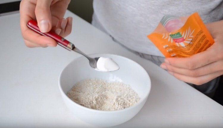 In chopped oatmeal, add baking powder.