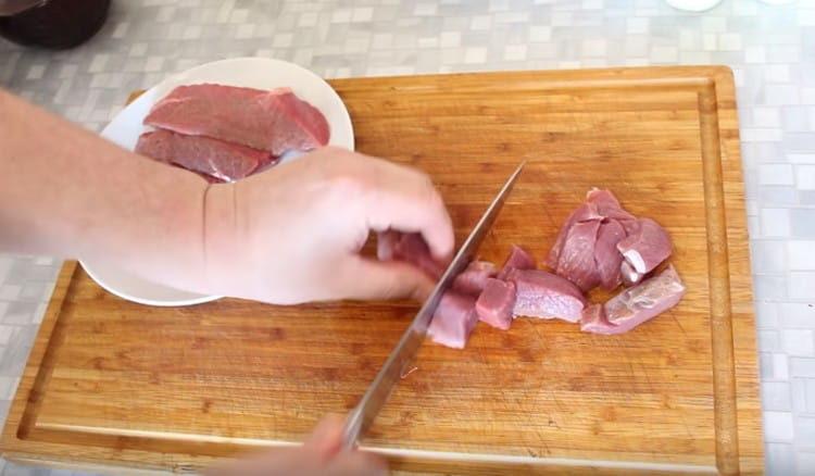 Cut the meat into pieces.