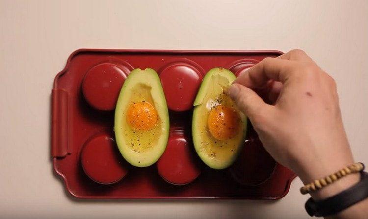 Salt and pepper the eggs.