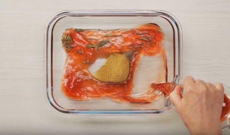 We add wine vinegar and water to the spices.