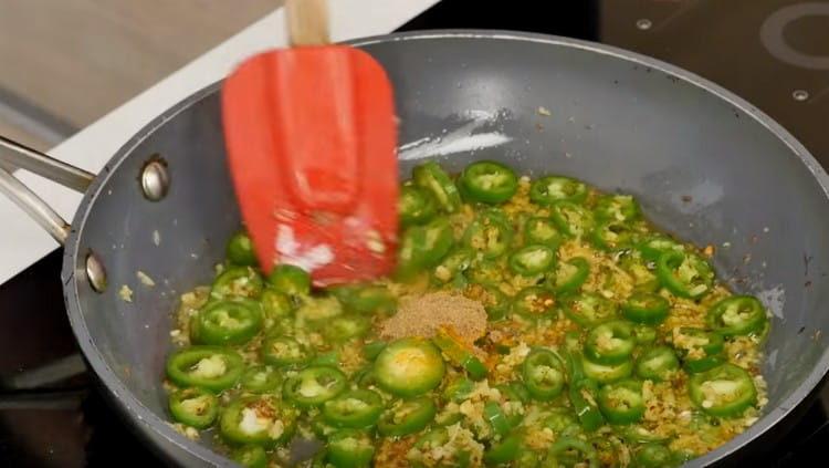 Add turmeric and coriander.