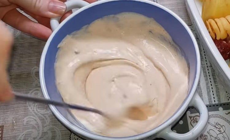 Preparing the fill for the dish.