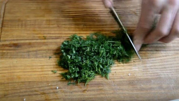 Finely chop fresh dill.