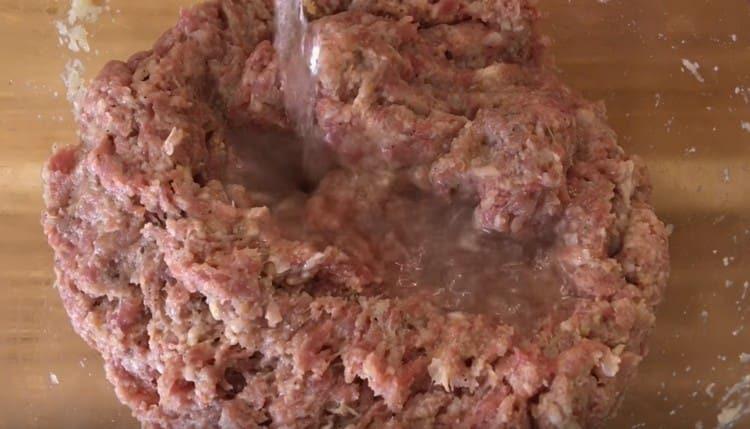 For juiciness, add water to the minced meat.