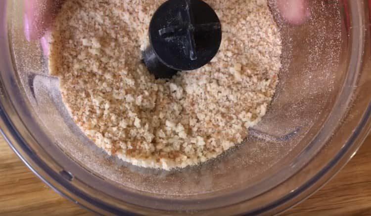 Grind the bread dried in the oven.