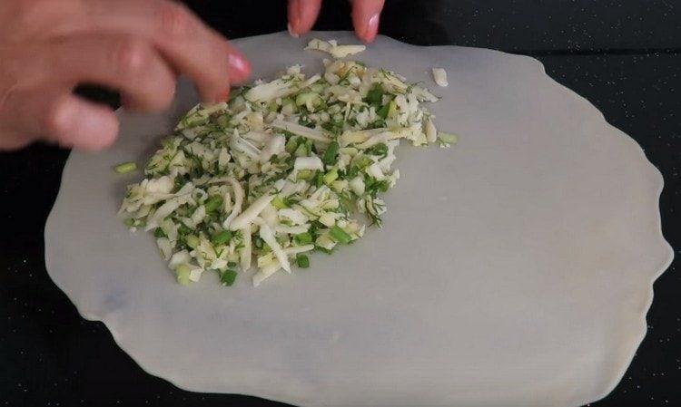 We spread the filling on one half of the tortillas.