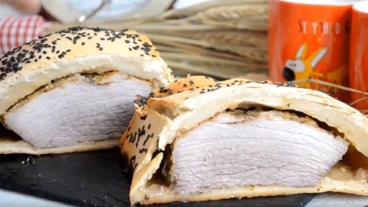 The meat in the dough is very tasty, it can even be served on the festive table.