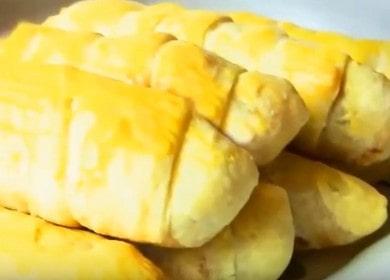 Tasty sausages in pastry  with cheese