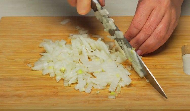 Finely chop the carrots and onions.