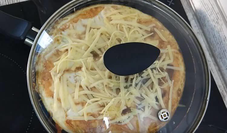 Sprinkle the dish with cheese and the remaining herbs.