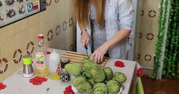 cut off the stem of the artichoke
