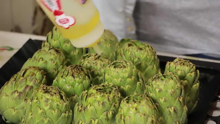 pour artichoke with oil