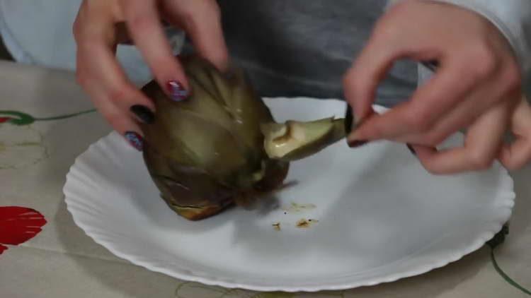 tear off the upper leaves of the artichoke