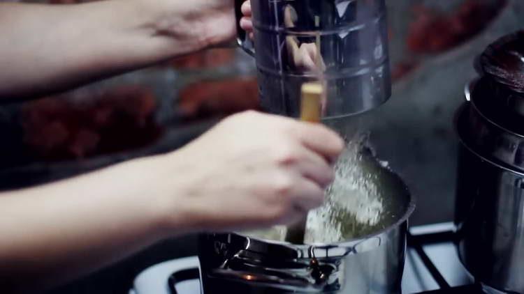 pour flour into the pan