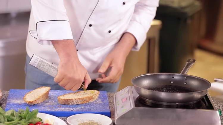 pour bruschetta with oil