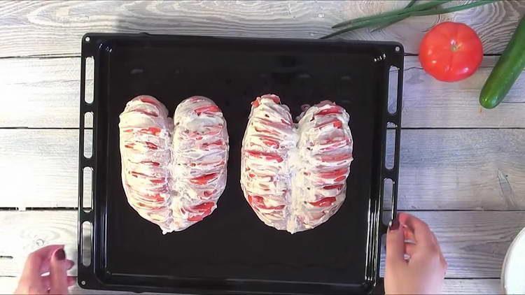 breast in the oven with cheese and tomatoes