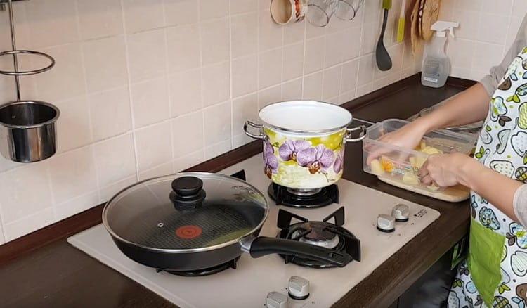 We clean the potatoes and boil them until cooked.