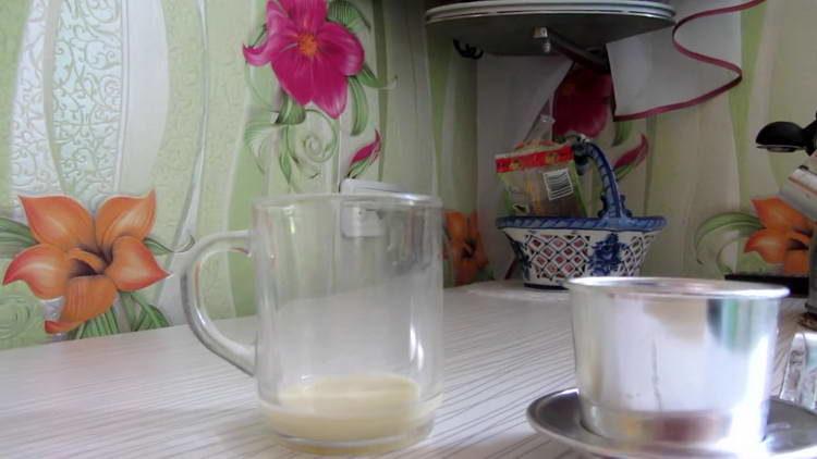 pour condensed milk into a cup