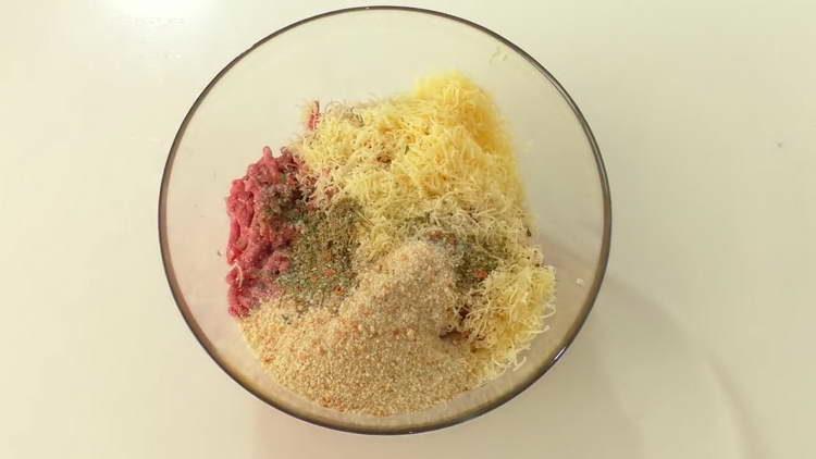 mix minced meat and grated cheese