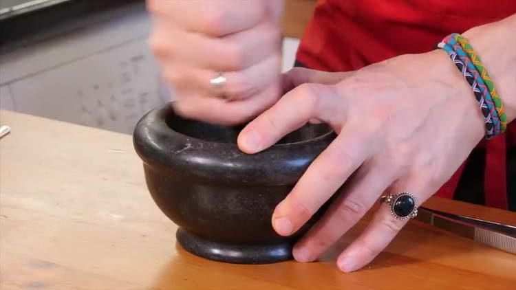 in a mortar we crush salt and spices