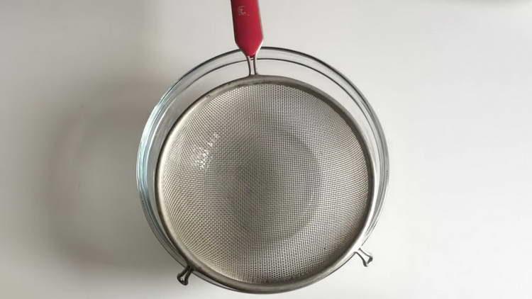 put a sieve in a bowl