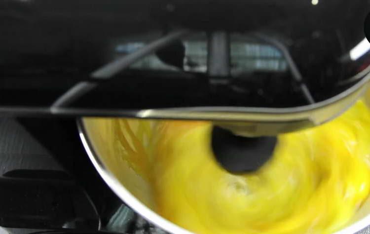 drive the yolks into the mixer bowl